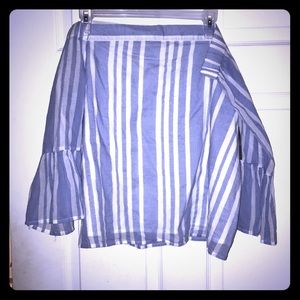 Off the shoulder long sleeved top.